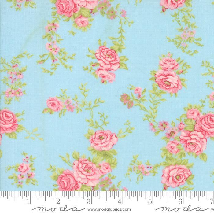 Fleurs by Brenda Riddle quilt fabric by Moda features a pink rose on blue