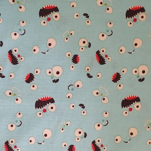 $6.95/Metre -Googly Eyes Faces Scattered Blue
